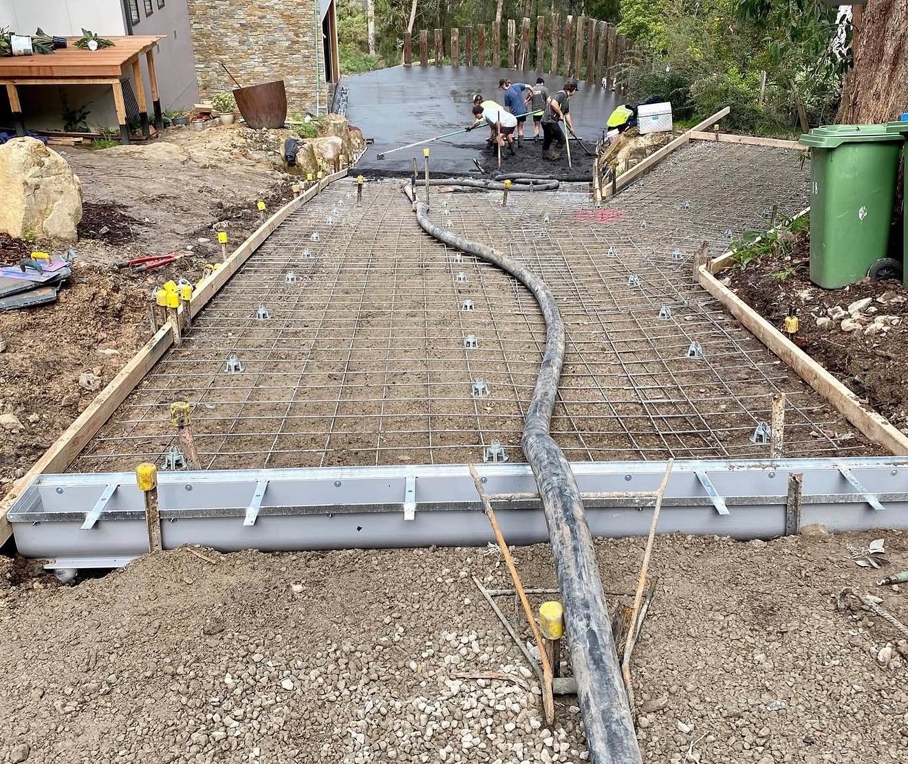 Driveway rebar mesh concrete pour in progress