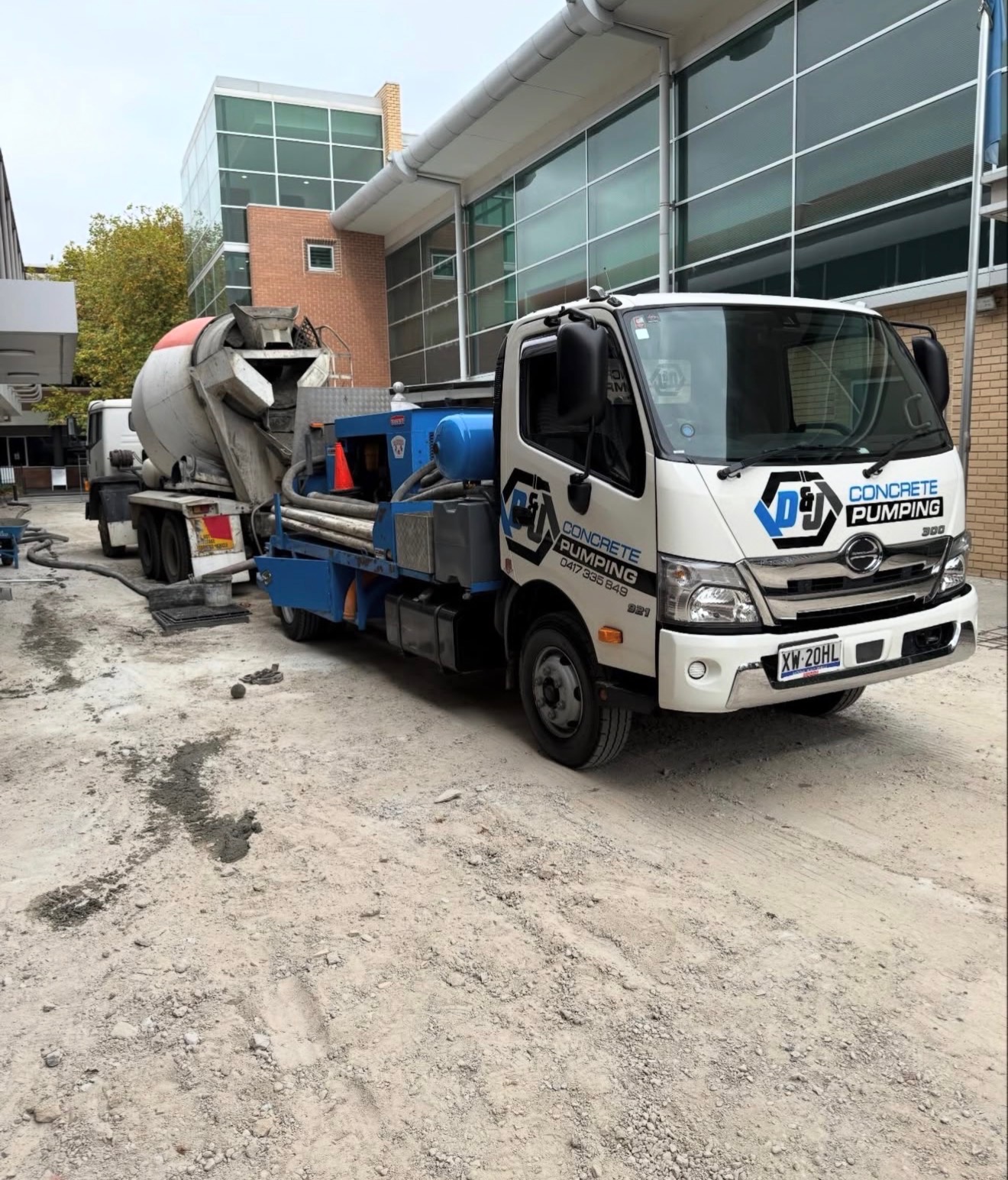 Line pump truck on commercial job site